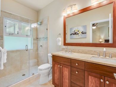 Spacious Bathroom with Shower Over Tub